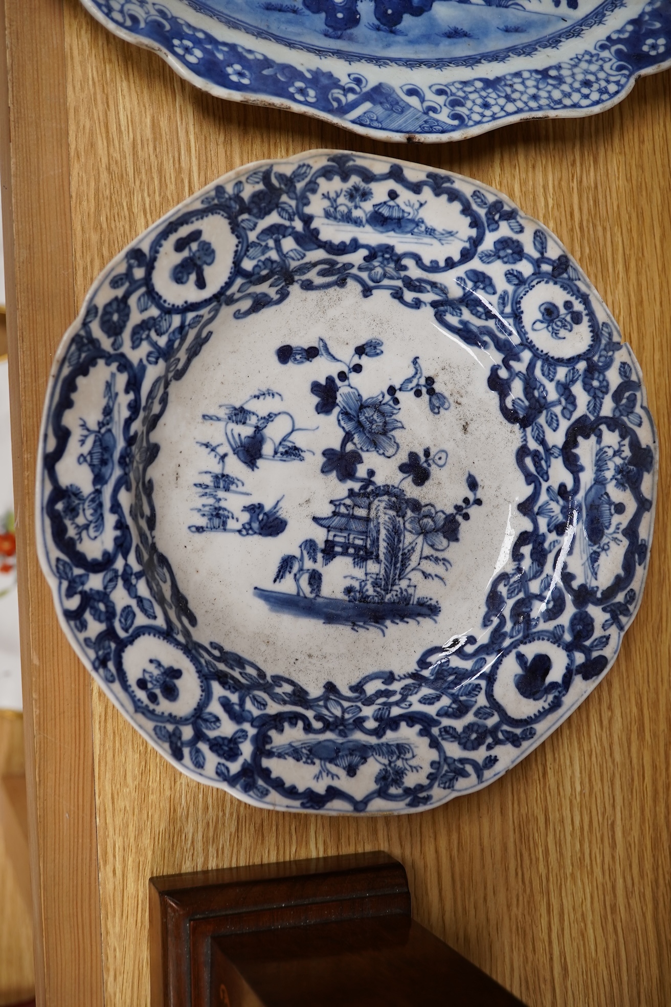 Two 18th century Chinese blue and white dishes, largest 31cm
